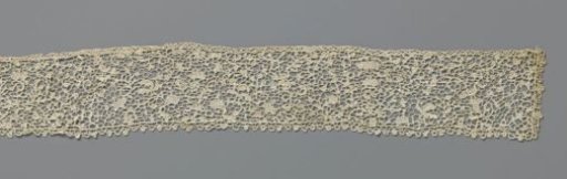 Strip of needle lace with birds