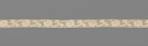 Strip of bobbin lace with linked wavy flower stems with one flower
