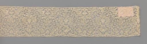 Strip of bobbin lace with twigs with five leaves on the center line