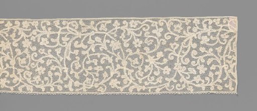 Bobbin lace strip with curling vines made with ribbons