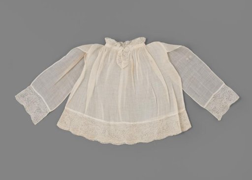 Cambric Shirt with a Child Christ Figure and Edges of Bobbin Lace