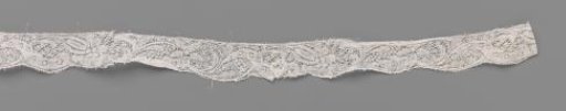 Strip of bobbin lace with plume-shaped flower and star-shaped flower