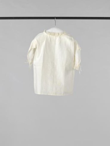 A child's shirt, linen with edging of Binche lace