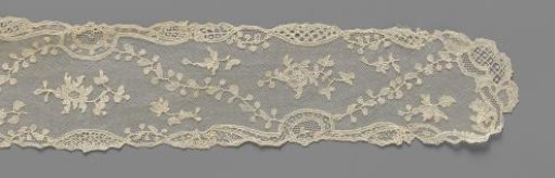 Cap Frill of Applied Lace with Three Single-Flowered Sprays in the Fields Between a Wavy Leafy Branch