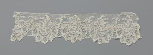 Strip of needle lace with horizontal C-scroll with five lobes