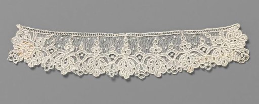 Cuff of needle lace with hanging flowers and intertwining stems