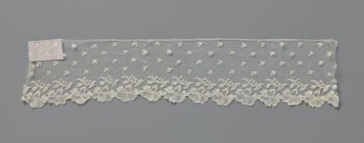 Strip of cutwork appliqué with cornflower border