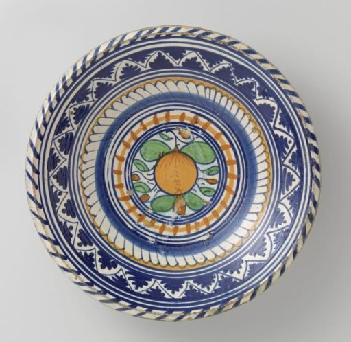 Dish, Multicolored Painted with a Tropical Fruit within Concentric Circles, Yellow Border and Orange Stripes, Frieze with Leaves, Zigzag Line and Stripes on the Outer Rim