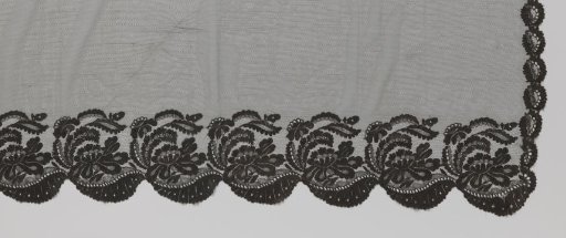Rectangular mantilla with borders of black bobbin lace