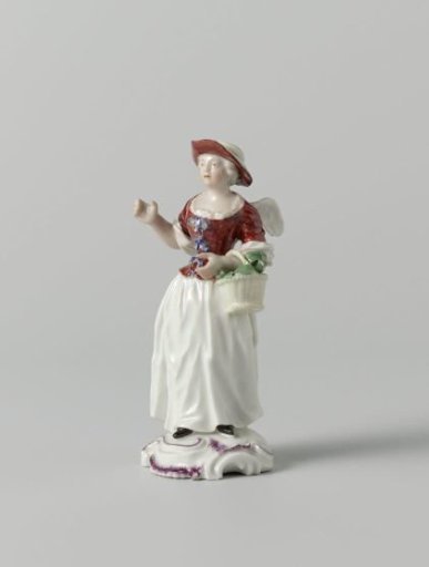 Figure of a woman with wings and a basket