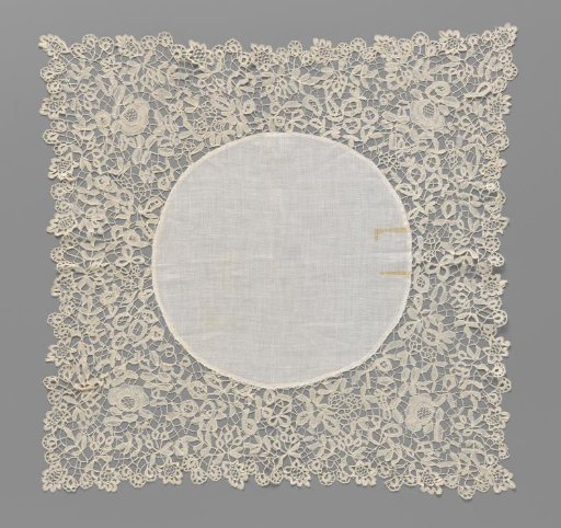 Handkerchief of batiste with a wide border of bobbin lace with oval flowers