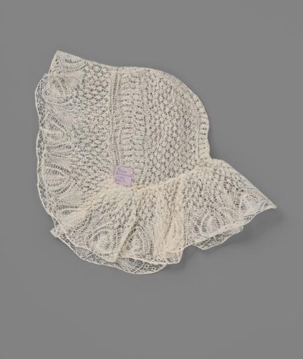 Cap of knitted lace