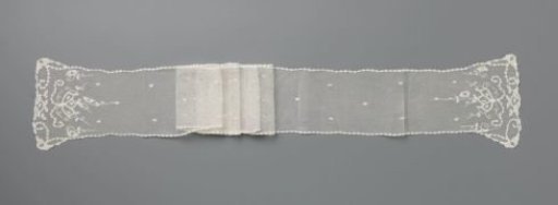 Piece of appliqué lace with a water lily at each end