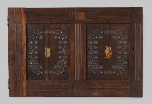 Door, part of a paneling from the house of Dentz van Schaick. Carved and inlaid stylized floral and leaf motifs and animal and figurative representations. Mark with white paint: AB8BI.