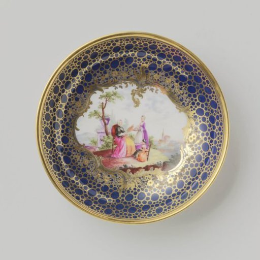 Saucer with a couple in a landscape