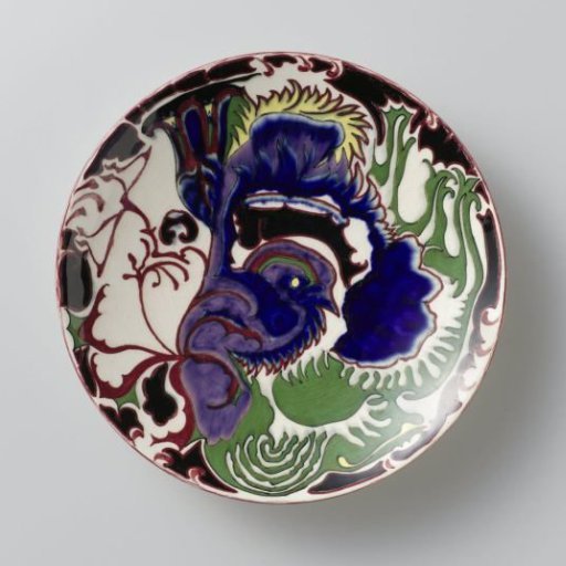 Wall plaque, polychrome painted with a bird motif