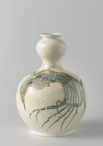 Vase with a bird of paradise