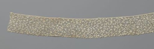 Strip of needle lace with a fine scroll ornament