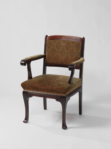 Armchair of brown-stained mahogany