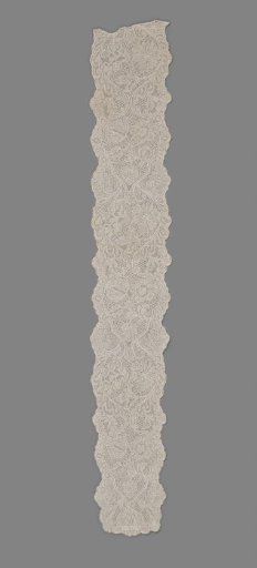 Cap trim of Binche lace with floral motif