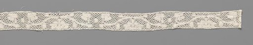 Strip of bobbin lace with symmetrical volute scroll, lobed flower, and two flower buds
