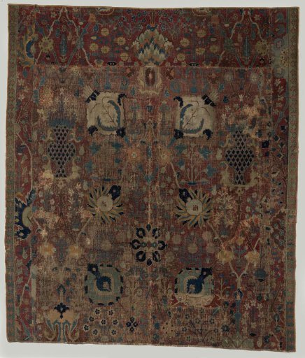 Fragment of an Eastern carpet: central field with lotus flowers, rosettes, and vases.