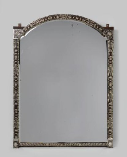 Mirror with ebony frame featuring silver filigree mounts