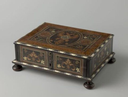 Chest with marquetry featuring a double eagle and a monogram within an oval frame on the lid