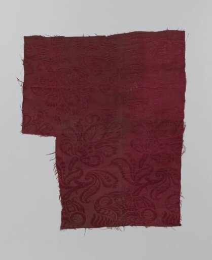 Fragment of red silk damask