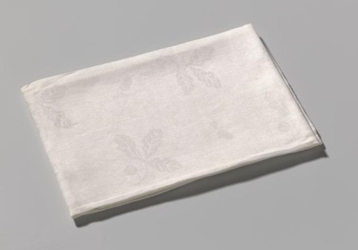 Napkin of linen damask with coats of arms