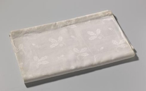 Tablecloth of linen damask with coats of arms