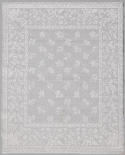 Linen damask napkin with a floral pattern