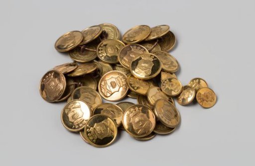 Livery buttons of copper with the coat of arms Van Hees