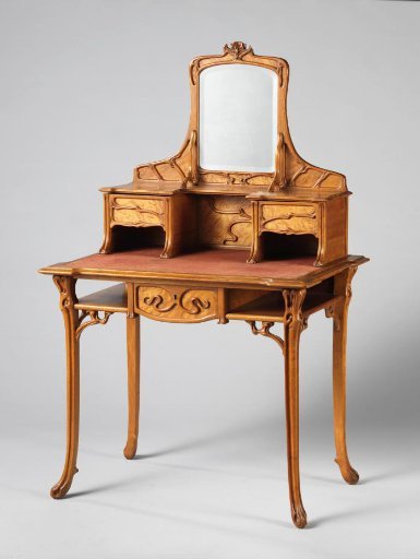 Dressing table consisting of a table-shaped base upholstered in red velvet and a top piece with a mirror