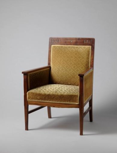 Armchair of mahogany, inlaid with ebony and mother-of-pearl