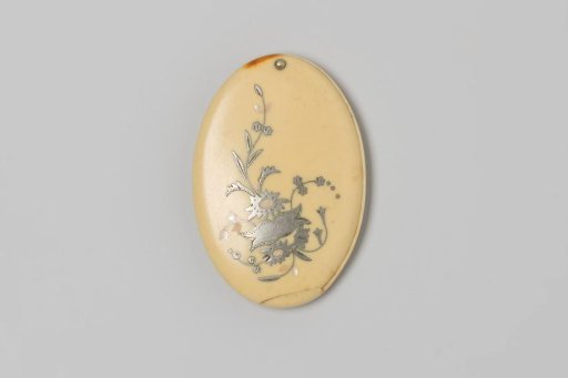 Pocket mirror in an ivory case