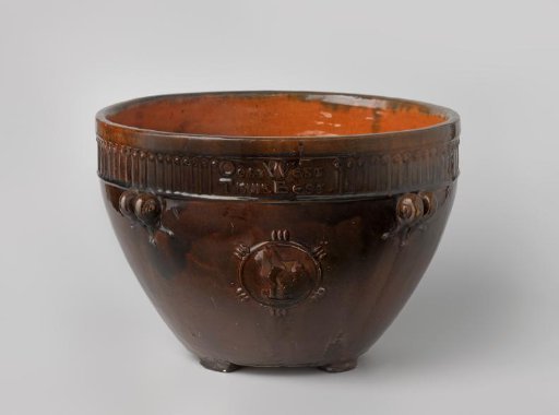 Pot with inscription East West Home Best