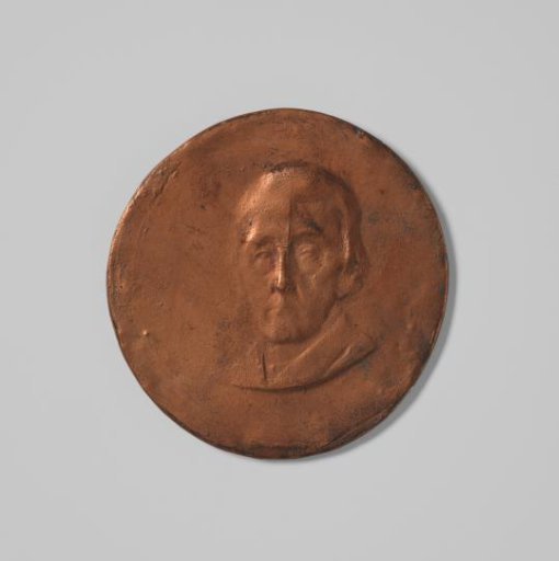 Cast of a design for a medal with a male portrait