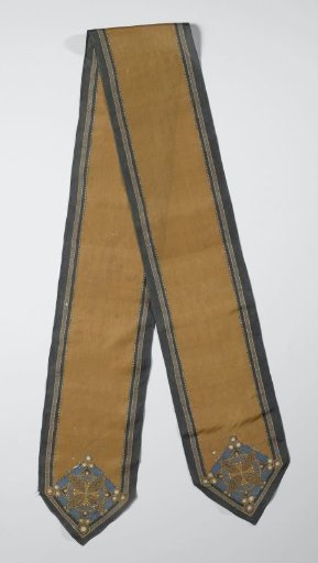 Long Batiked Scarf in Brown, Green, Black, Blue and White, with an Unadorned Brown Middle Section Within a Green Border, Star Motif in the Two Pointed Ends