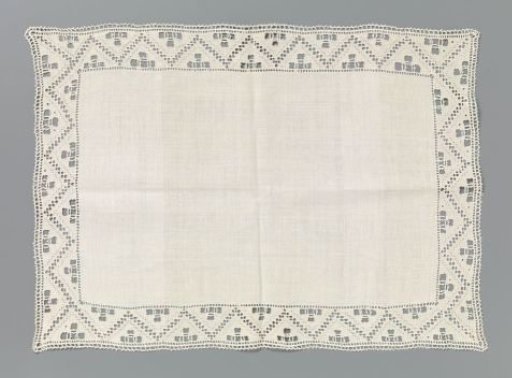 Linen cloth with a border of lace embroidery