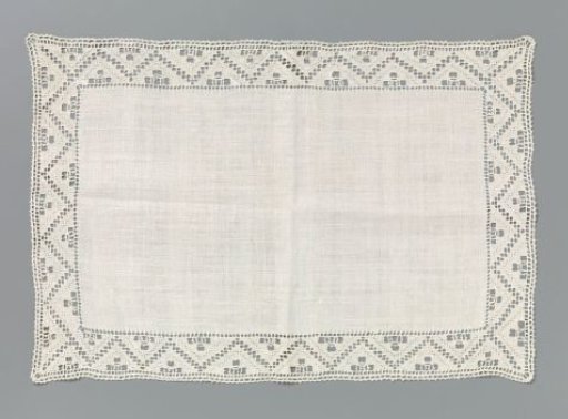 Linen cloth with a border of lace embroidery