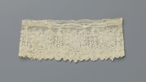 Cuff of needle lace with flower branch in U-shaped cartouche