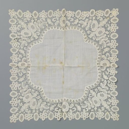 Handkerchief of white batiste with a border of Honiton lace