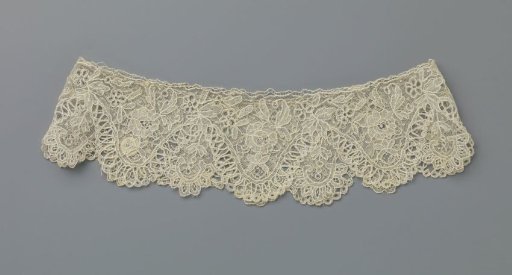 Cuff of needle lace with wavy zigzag border and rose branch