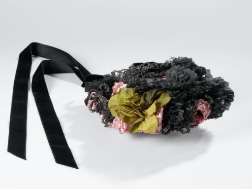Small hat of pink straw braid decorated with ribbons of black gauze de lisse, black velvet ribbons and a moss-green flower