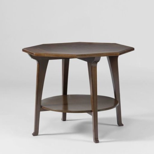 Table with an octagonal tabletop resting on four splayed legs