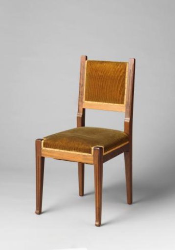 Chair upholstered in black-striped brownish-yellow leather