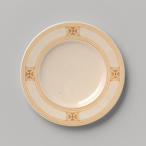 Cake plate decorated with a block pattern and dots in yellow and black