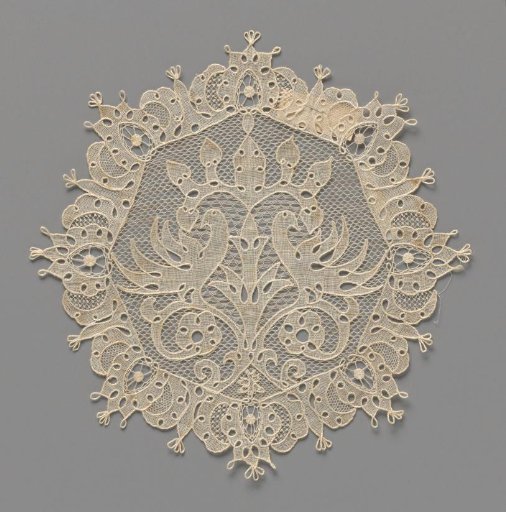 Linen cloth with needle lace depicting birds in a tree