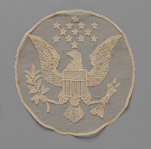 Insert of needle lace with the coat of arms of the United States with eagle and stars